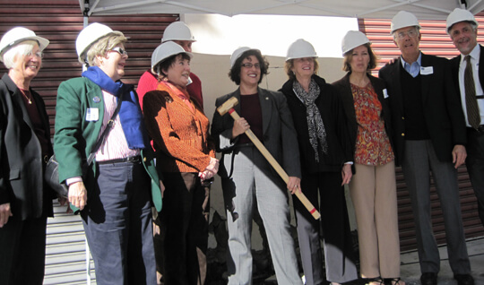 Former Santa Barbara Mayor Marty Blum, left to right, Cheryl Rogers, Catherine Woodford, Stanley Eisele, Santa Barbara Mayor Helene Schneider, Barbara Allen, Mary Johnston-de Leon, David Hughes and Housing Authority CEO Rob Pearson help with Wednesday's groundbreaking for the Artisan Court affordable housing development on East Cota Street