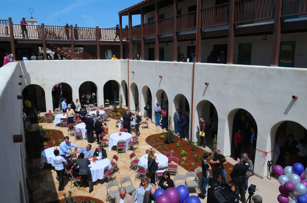 A celebration on Wednesday marked completion of the Artisan Court apartment complex on East Cota Street designed for formerly homeless individuals, youth aging out of foster care and low-income downtown workers.