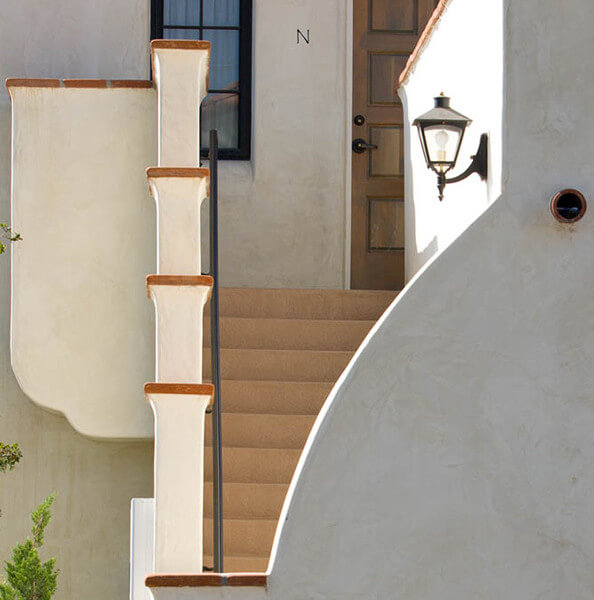 Outside view of a stairway leading up to a unit