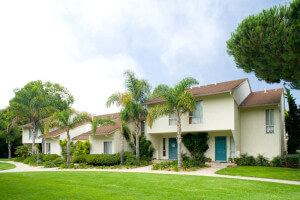 View of the grass and pathway in front of the units