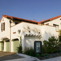 Outside view of the Voluntario building and garages