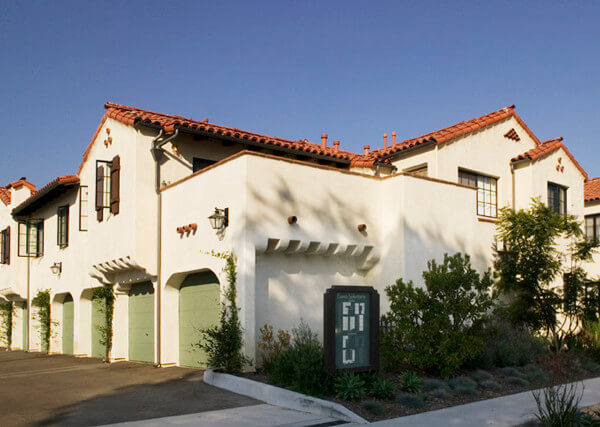 Outside view of the Voluntario building and garages