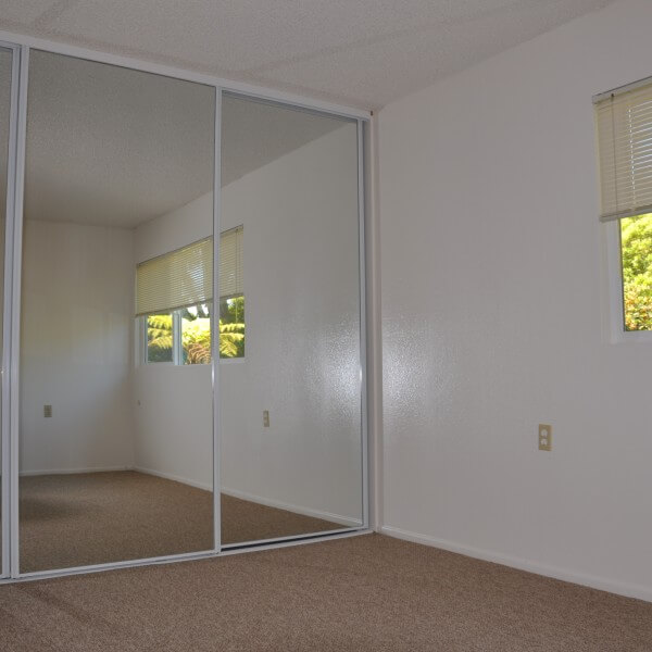 Villa Santa Fe apartment bedroom and mirror closets