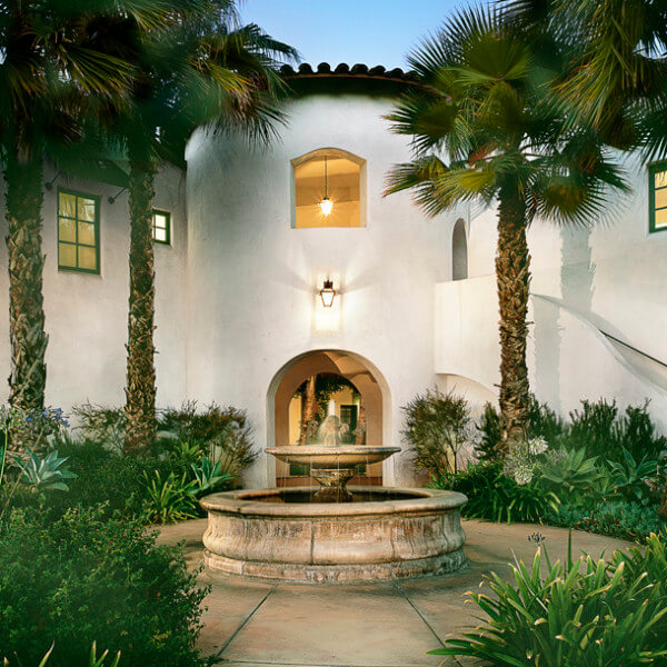 Outside view of the water fountain and plants on the property