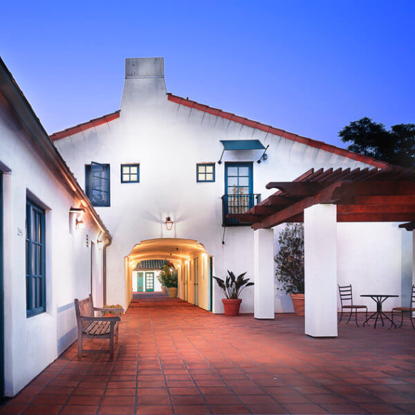 Outside view of the walkway outside the units, at dusk