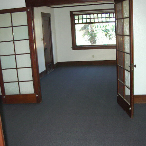 Inside a unit, view of open doors leading to a room
