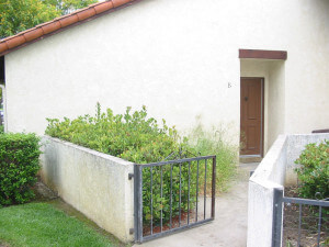 Outside view of a unit and the path leading to the door