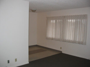 Inside a unit, view of the living room and partial hallway