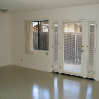 Insidie a unit, view of the living room with a door leading outside