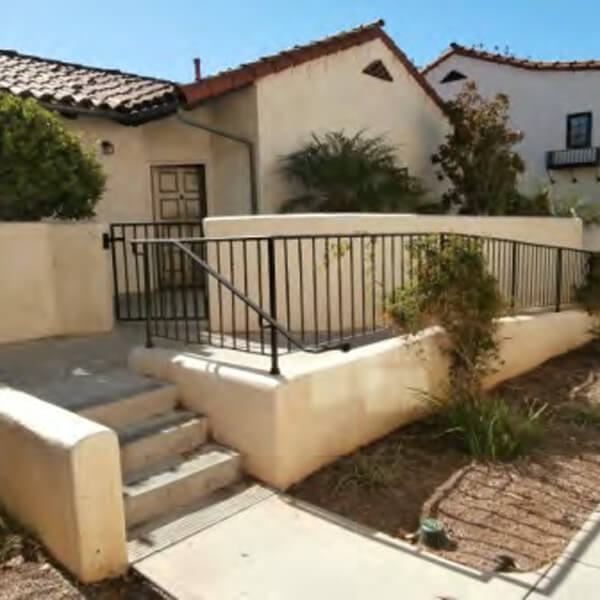 Outside view of a Voluntario building and ramp