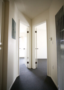 Inside of a Voluntario, showing a hallway with two doors