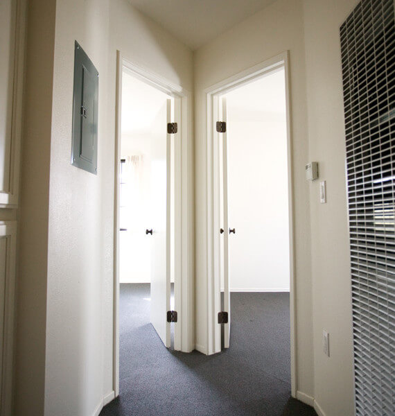 Inside of a Voluntario, showing a hallway with two doors