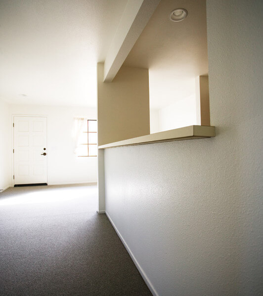 Inside of a Voluntario, showing a close-up view of the wall separating the living room from the kitchen