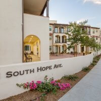 The Gardens on Hope front of building with 251 South Hope in lettering on wall