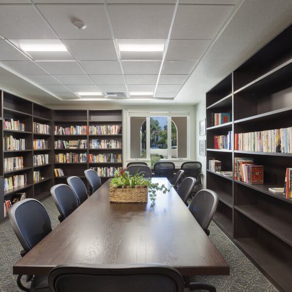 photo of library with table and chairs