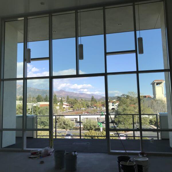 Window framing and outside view from Grace Village Apartments