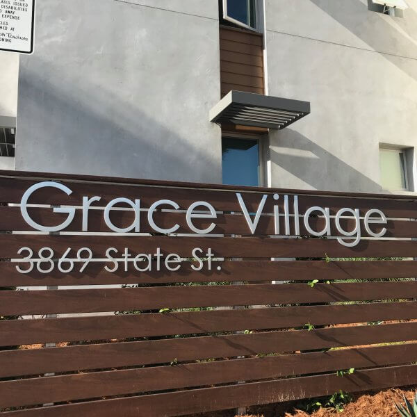 Front sign of Grace Village Apartments